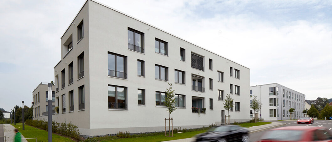 Teaser1 zeigt ein Foto Blick in die Rospestrasse Quartier Ackermann Gummersbach von Damrau Kusserow Architekten